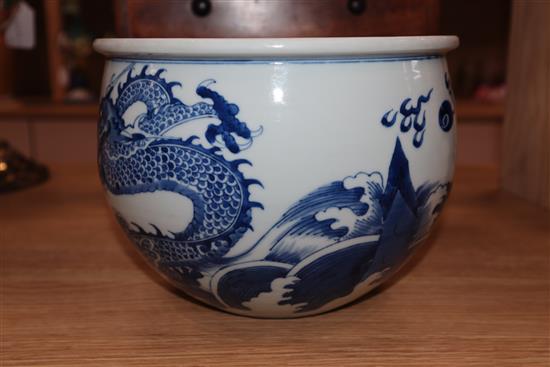 A Chinese blue and white dragon jardiniere height 16cm